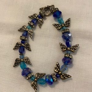 Bracelet blue beads w/ silver tone wings